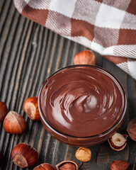 toasts with chocolate butter on a dark wooden rustic background