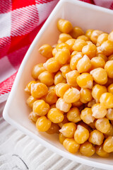 boiled chickpeas on a white wooden rustic background