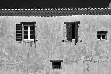 Windows in the wall of the historic Orthodox monastery in Zakynthos