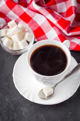 cup of instant coffee on a dark stone background