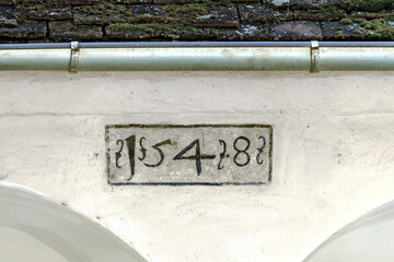 inscription of the year 1548 on a building at the old town of Krems in the Danube valley, Austria