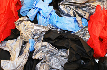 Rubber medical protective gloves on a white background, protection against a viral infection.