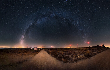 Beautiful image of an astronomical observatory and the Milky Way. Arch of the Milky Way on a...