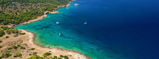 Fototapeta na wymiar Aerial drone ultra wide panoramic photo of tropical exotic mediterranean bay with luxurious yachts and turquoise crystal clear sea