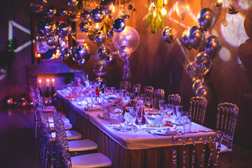 Decoration interior elements of restaurant venue banquet hall with multicoloured different helium...