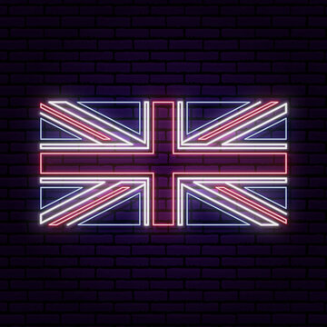 Neon sign in the form of the flag of Great Britain. Against the background of a brick wall with a shadow. for the design of a tourist or patriotic theme. Blue red white colors.