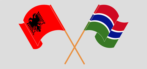 Crossed flags of Albania and the Gambia