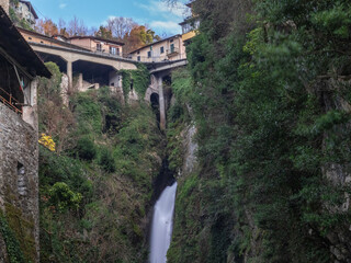 Canyon of Nesso with the waterfall seen from the Romanesque bridge of Civera.Como lake, Lombardy, Italian Lakes, Italy.