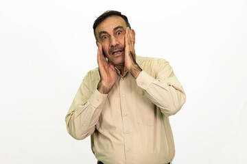 Surprised and sad man .. Wearing a yellow shirt. Isolated image white background.