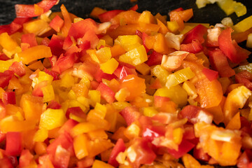 A close up of diced bell peppers