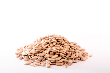 Isolated sunflower seeds viewed from above.