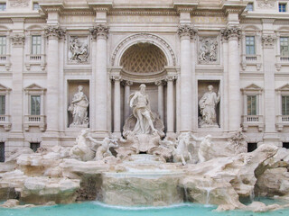 A front view of the famous Trevi Fountain in Rome, which was designed by Nicola Salvi and completed by Giuseppe Pannini and several others.