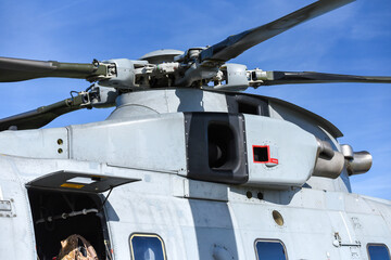 Fototapeta na wymiar Close up rotor and rotor head of a heavy military helicopter.
