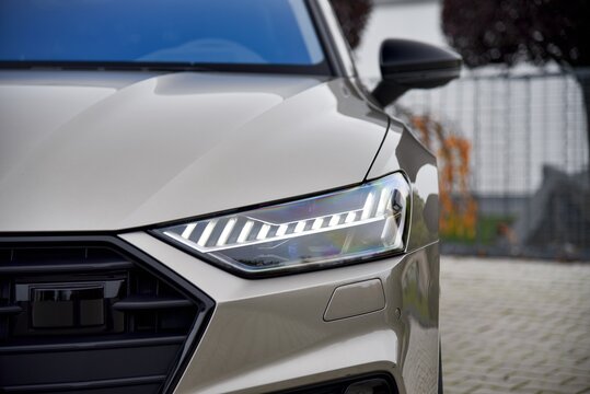 Audi A7 55 TFSI e quattro. Plug-in hybrid car. Headlight detail. 10-27-2020, Prague, Czech Republic.