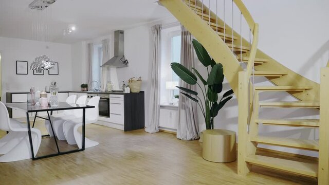 Motion controlled shot of homestaging living room with staircase