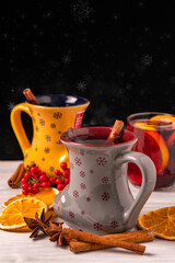 German tradition winter Christmas market new year holidays festival drink punch tea Gluhwein Mulled sweet hot warm red Wine with spices citrus aromatic cinnamon