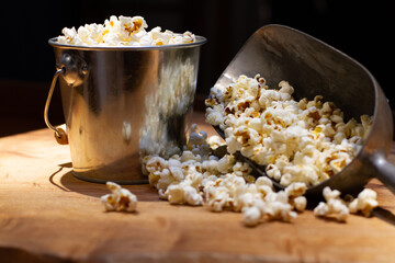 bucket of popcorn on the kitchen bench, ready to be eaten