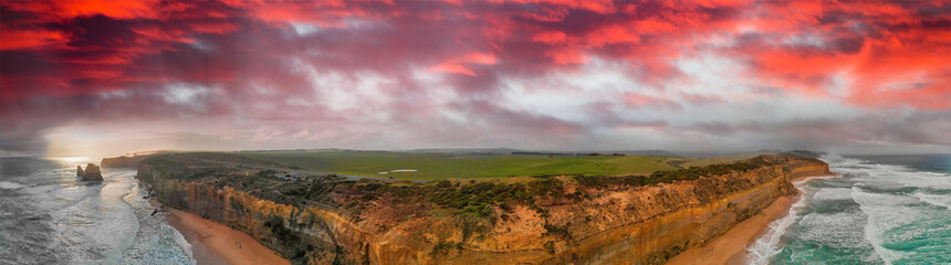 Fototapeta premium Panoramic sunset aerial view of amazing Twelve Apostles area along the Great Ocean Road