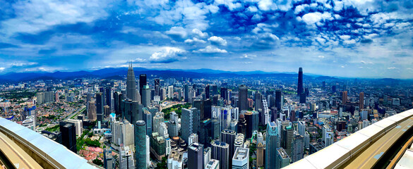 KUALA LUMPUR, MALAYSIA - DECEMBER 28, 2019: Amazing panoramic city skyline from city rooftop on a beautiful sunny morning