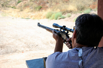 Target practice with a lever-action rifle