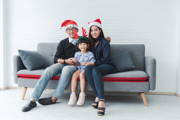 Celebrate holidays and happy family days, Group of family asia sitting on the sofa.