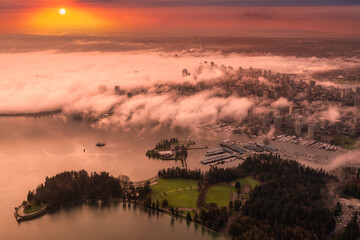 Downtown Vancouver, British Columbia, Canada. Aerial View of the Modern Urban City, Stanley Park, Harbour and Port. Viewed from Airplane Above. Colorful Sunrise Artistic Render