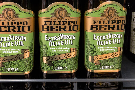 BELGRADE, SERBIA - DECEMBER 10, 2020: Filippo Berio logo on bottle of olive oil for sale. Filippo Berio is an idustrial italian company specialized in olive products, especially oil
