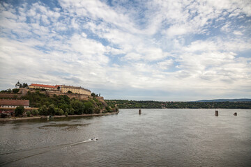 Fototapeta na wymiar Petrovaradin Fortress in Novi Sad, Serbia, on Danube river, on a cloudy afternoon. This castle is one of the main landmarks of Novi Sad and Voivodina