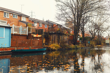 Birmingham, the heart of Britain canal network, for narrowboat as a reminder of a unique industrial history. Birmingham in golden autumn foliage is known as the first manufacturing town in the world