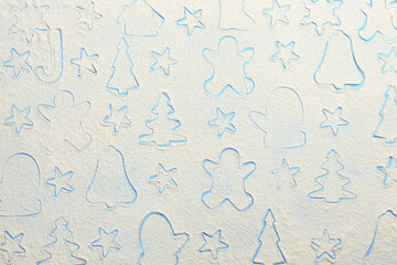Different Christmas cookie shapes made of flour on light blue background, top view