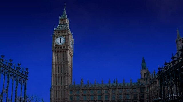 Celebratory fireworks for new year over big ben tower or clock in London, united kingdom ( UK ) during last night of year. Christmas atmosphere