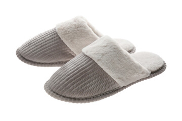 Pair of soft closed toe slippers on white background