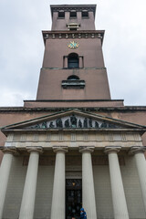 Clock tower of Church of Our Lady (Vor Frue Kirke)  situated on Frue Plads public square in central Copenhagen, next to the historic main building of the University of Copenhagen