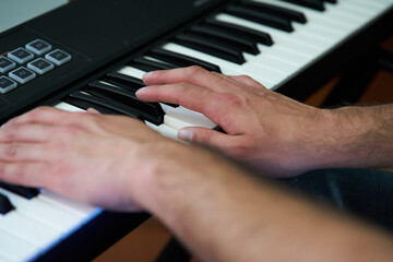 detail shot of the pianist's fingers