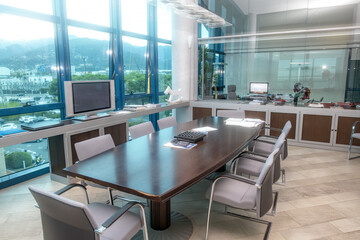 Office cabinet with modern desktop and chairs. meeting with company leaders