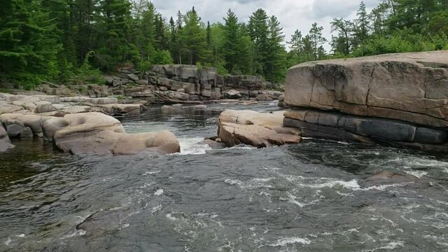 White water rushing at Pabineau Falls, New Brunswick, Canada