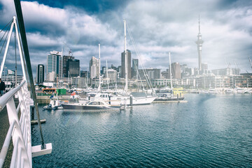 Fototapeta na wymiar AUCKLAND, NZ - AUGUST 27, 2018: Auckland waterfront boats on a beautiful morning