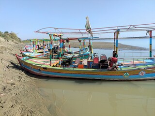 fishing boats on the river