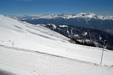 Winter landscape in the mountains with peaks and gorges, freestyle trails.