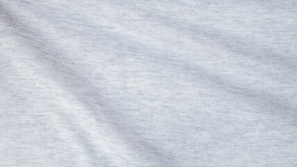 High resolution, detail shot of soft white gray jersey fabric background. Polyester and cotton clothing wallpaper with copy space for text.