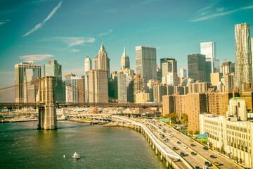 Fototapeta premium Amazing sunset colors of New York. Lower Manhattan skyline