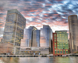 Fototapeta na wymiar Boston Waterfront skyline. City buildings at sunset seen from Fort Point Channel