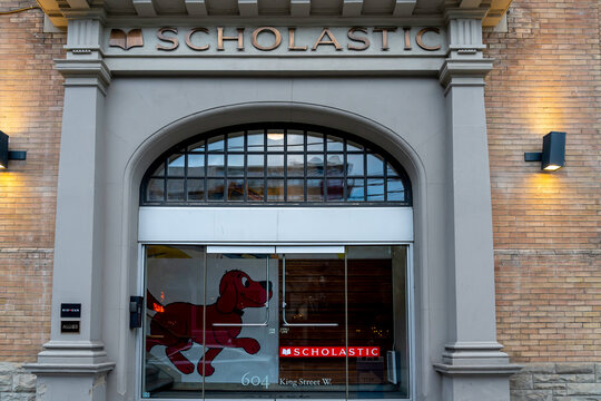 Toronto, Canada - September 25, 2019: Entrance of Scholastic Canada in downtown Toronto. Scholastic Canada is publisher and distributor of children's books and educational materials. 