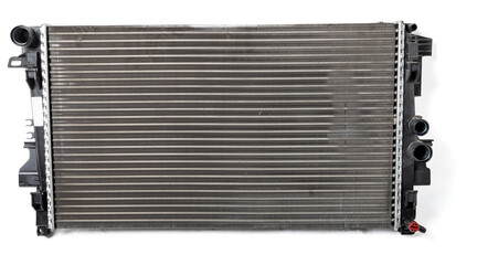 The old cooling radiator is a metal heat exchanger inside filled with antifreeze. Repair in the workshop. Parts Catalog.