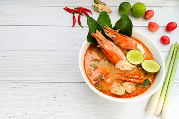 Tom yum soup. Tom yam kung is a thai spicy soup with shrimps, lemongrass,lime, ginger, galangal and coconut milk. Thai food. Space for text