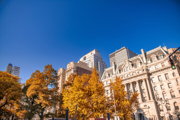 Naklejka premium Downtown Manhattan old buildings from Brooklyn Bridge at sunset, New York City