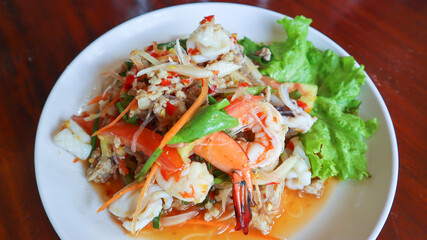 Thai spicy vermicelli salad with seafood and minced pork (Yum Woon Sen).