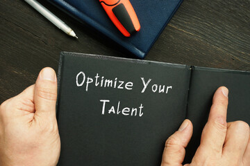  Optimize Your Talent sign on the piece of paper.