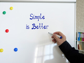 Conceptual photo about Simple is Better with written text.