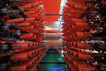 Bobbin in the packaging products processing line in a factory, North China
